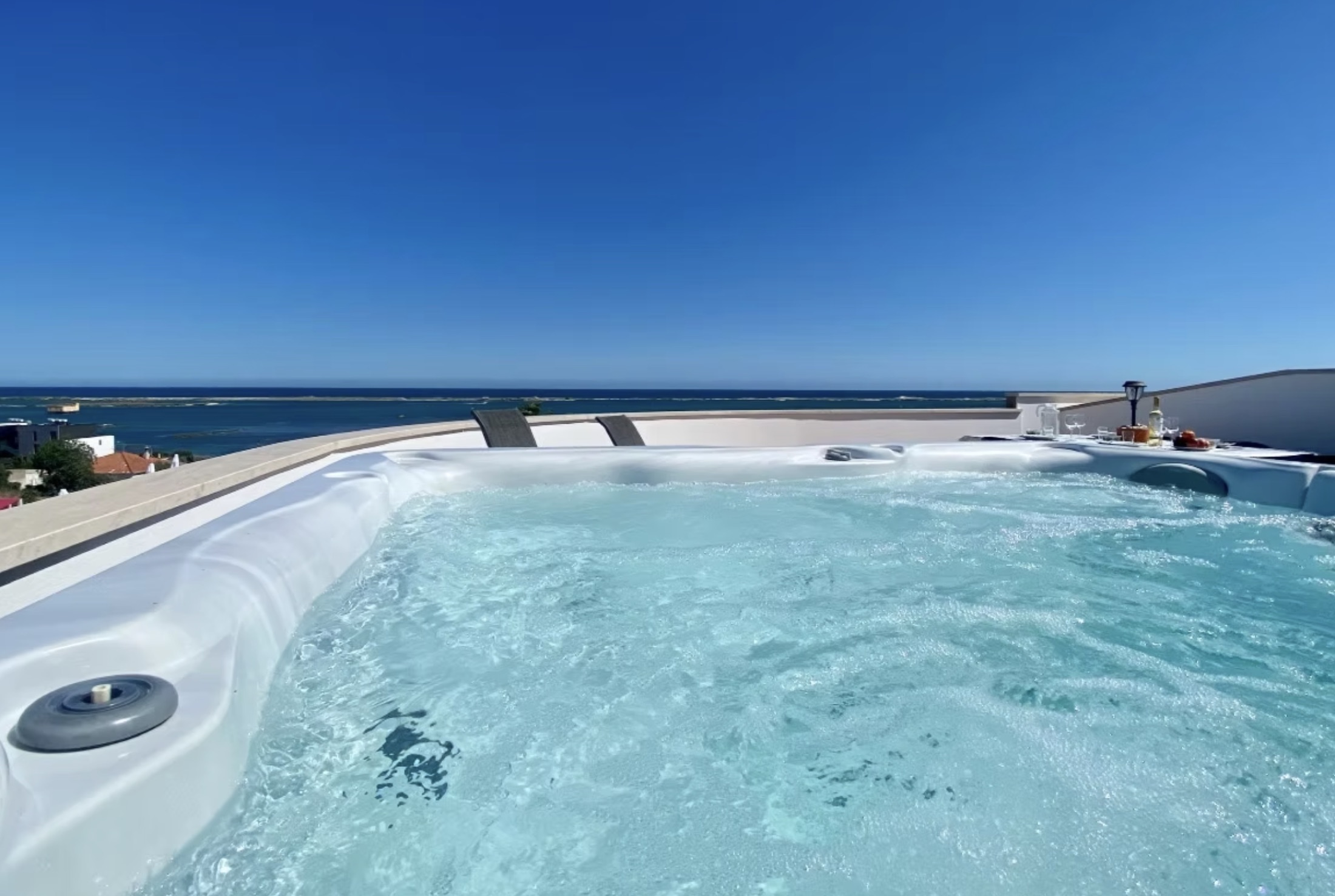 Private jacuzzi with ocean and lagoon view